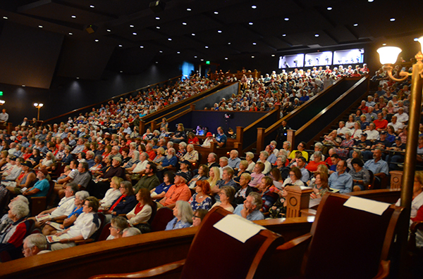 theater seats filled with patrons
